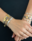 LES AMOURS metallic bracelet ♥ : Metallic ribbon with vermeil hearts.