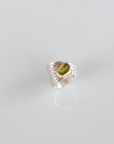 Reptilia silver earcuff with natural gemstone, finish and texture detail.