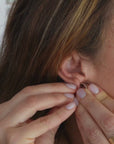 Reptilia vermeil earcuff with natural gemstone, close-up front angle.