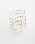 CONNECTION Cuff: Yellow gold and sterling silver