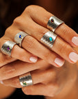 Close-up of the natural gemstone cabochon and bezel setting on the Reptilia silver ring.