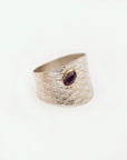Angled front view of the Reptilia silver ring with natural gemstone.