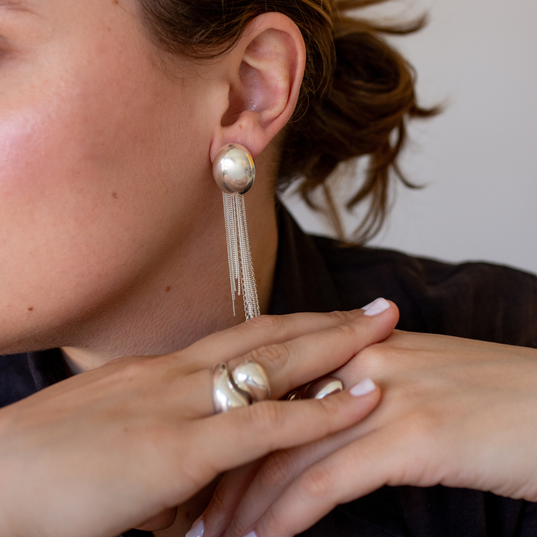 handmade-jewelry-merge-recycled-silver-cocoon-collection-in-hand.png