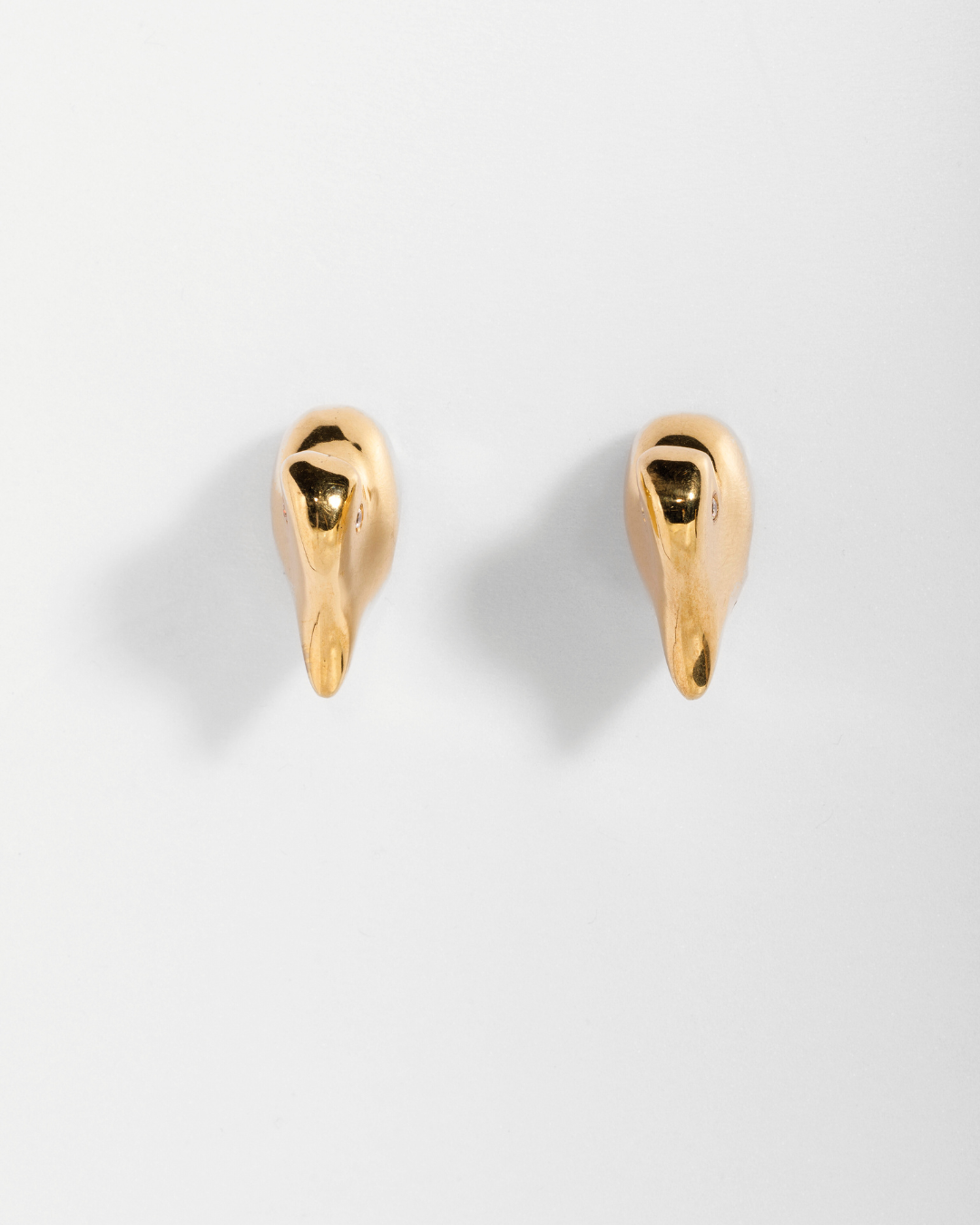 Bitten Heart earring in gold vermeil crafted from recycled sterling silver by Carlota Guardia Jewelry