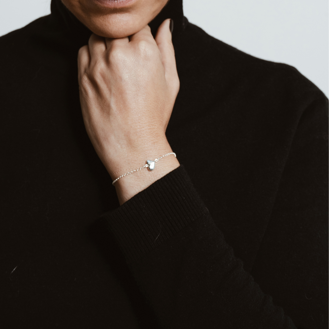 silver-diamond-bracelet-customizable-on-wrist.png