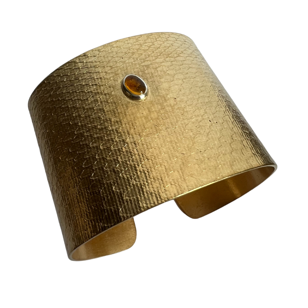 Angled view of the Reptilia Maxima vermeil cuff with citrine cabochon.